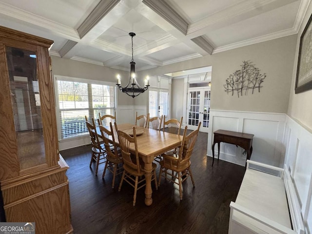 dining area with beamed ceiling, crown molding, and coffered ceiling