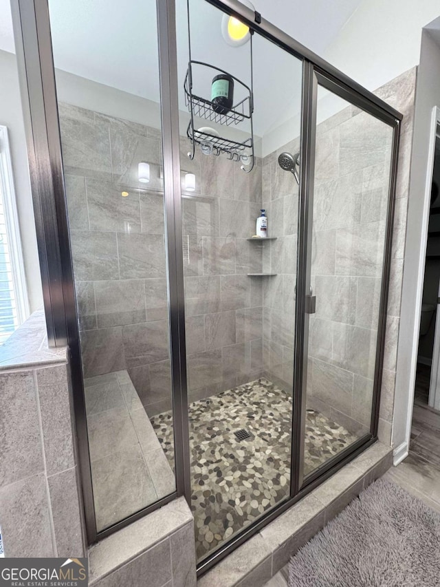 bathroom featuring walk in shower