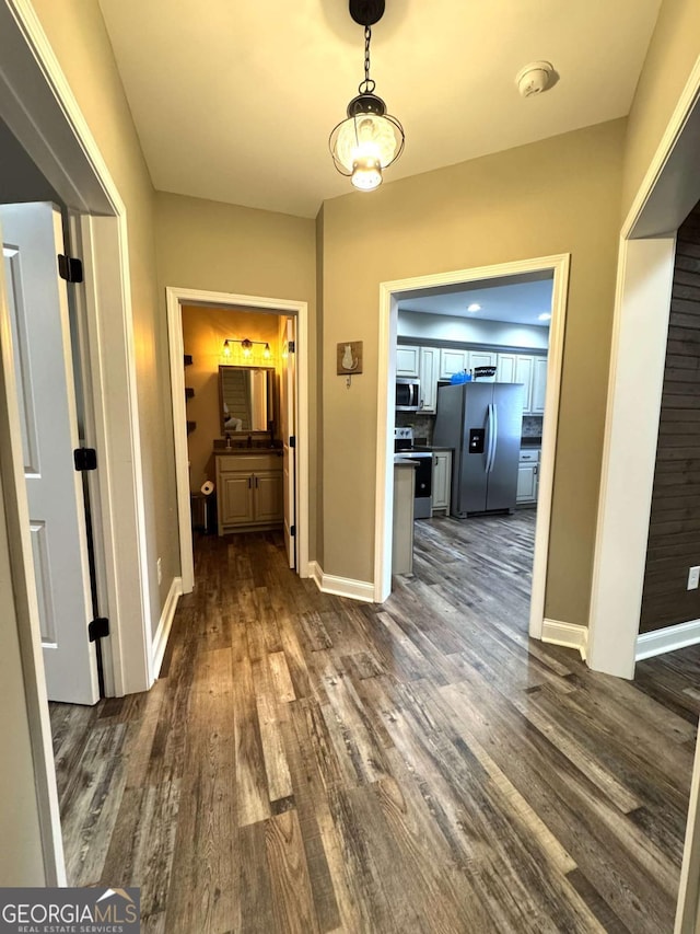 hall featuring dark hardwood / wood-style floors