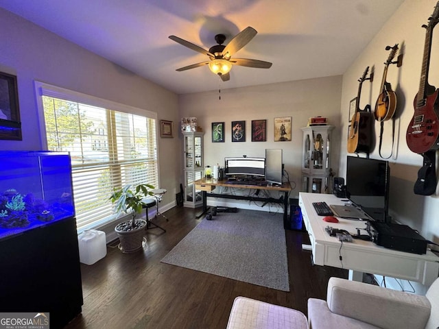 office featuring dark wood-type flooring and ceiling fan