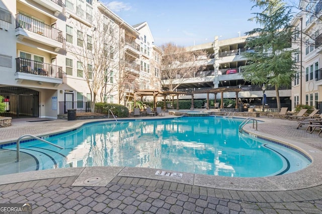 view of swimming pool featuring a patio