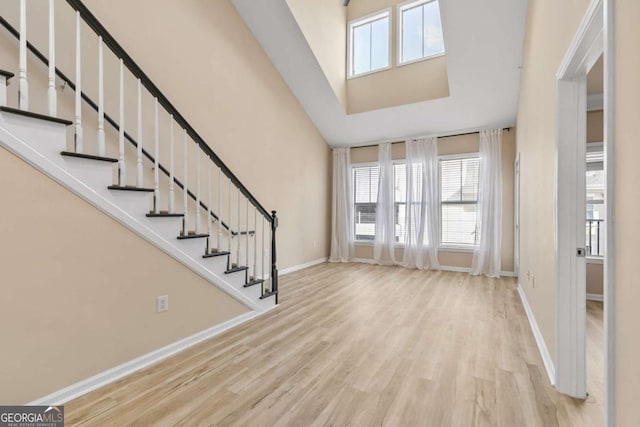 foyer entrance with light hardwood / wood-style flooring