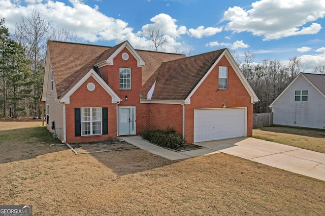 front facade featuring a garage and a front lawn