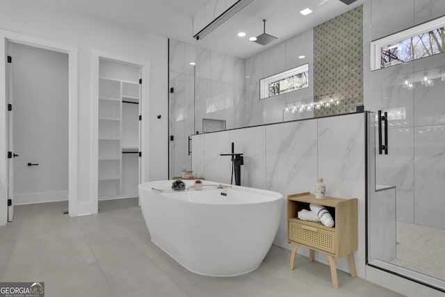 bathroom with tile patterned flooring and plus walk in shower