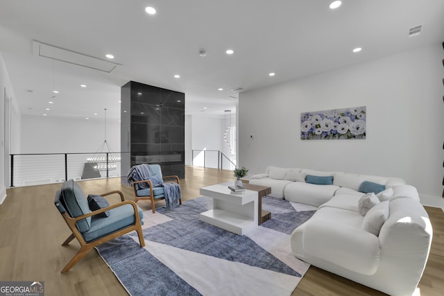 living room with light hardwood / wood-style floors