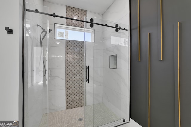 bathroom with an enclosed shower