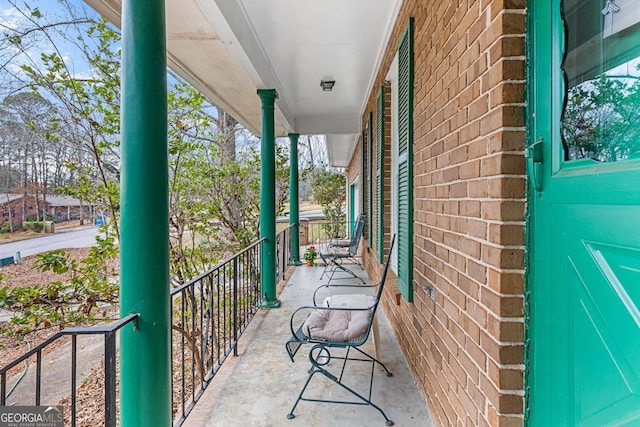 balcony featuring a porch