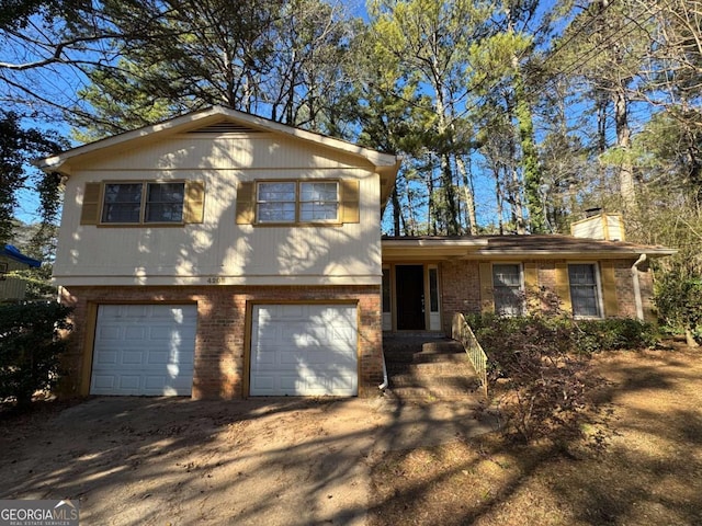 split level home featuring a garage