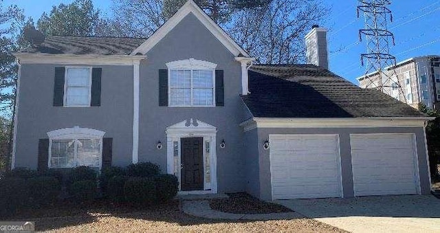 view of front of home with a garage