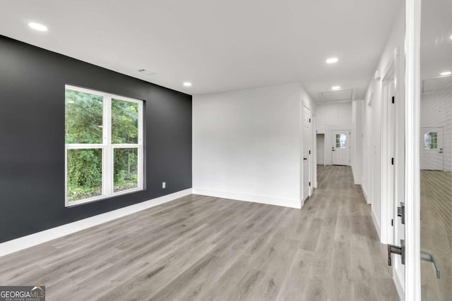 empty room with light wood-type flooring