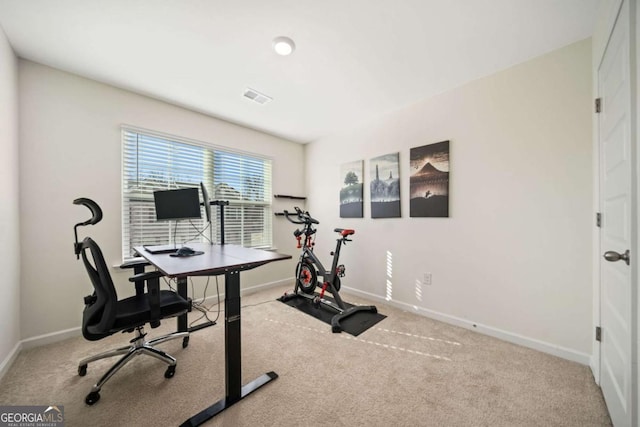 view of carpeted office space
