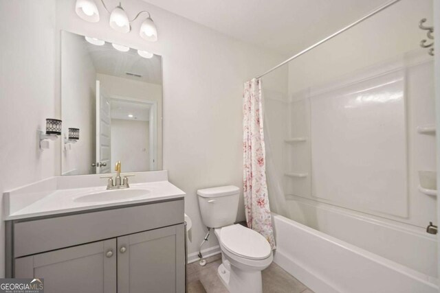 full bathroom with toilet, shower / tub combo, and vanity