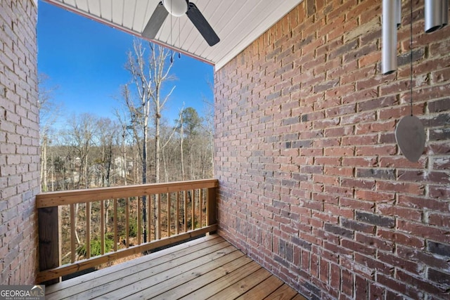 wooden terrace with ceiling fan