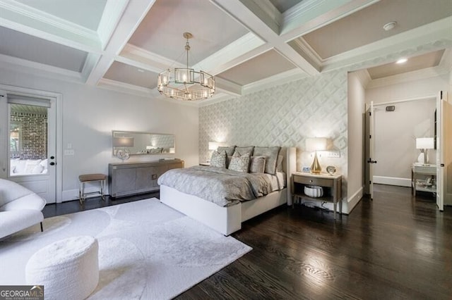 bedroom featuring dark wood-type flooring, beamed ceiling, an inviting chandelier, crown molding, and coffered ceiling