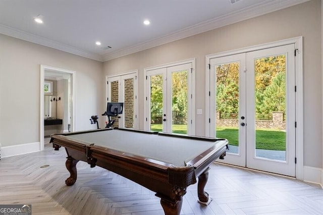 game room with light parquet floors, a wealth of natural light, crown molding, and french doors