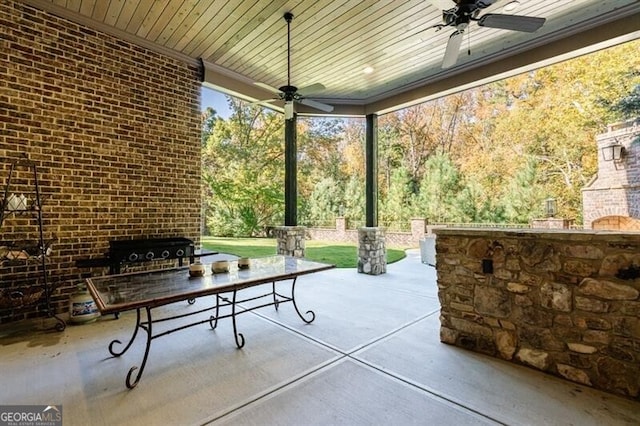 view of patio / terrace featuring ceiling fan