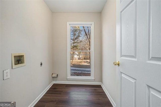 clothes washing area with dark hardwood / wood-style floors, electric dryer hookup, and hookup for a washing machine