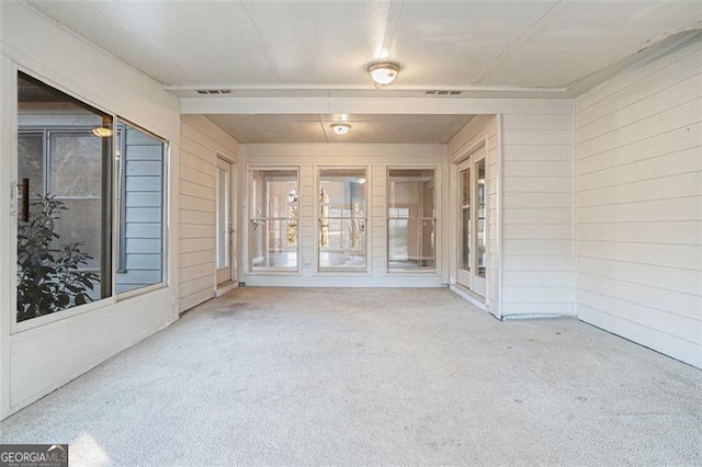 view of unfurnished sunroom