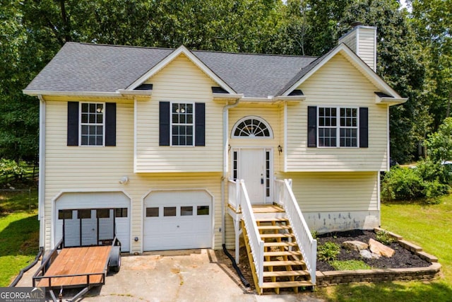 raised ranch with a garage