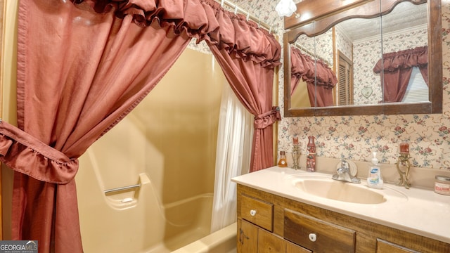 bathroom with a healthy amount of sunlight, vanity, and shower / tub combo with curtain