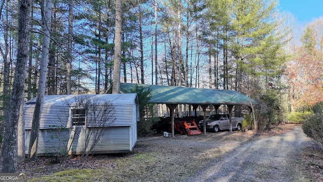 view of parking / parking lot with a carport