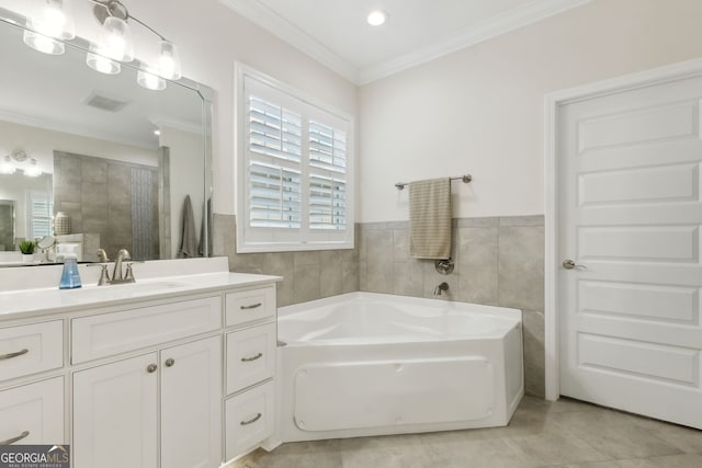 bathroom featuring vanity, tile patterned flooring, tile walls, crown molding, and a washtub