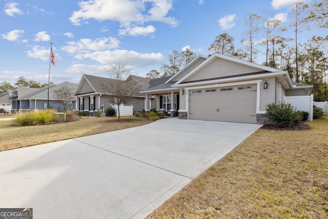 ranch-style house with a front yard and a garage