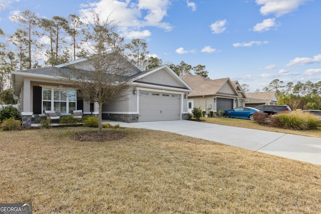 view of front facade featuring a front lawn and a garage