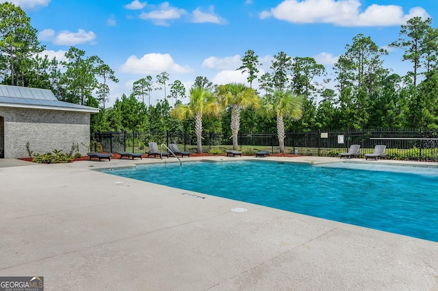 view of pool featuring a patio area