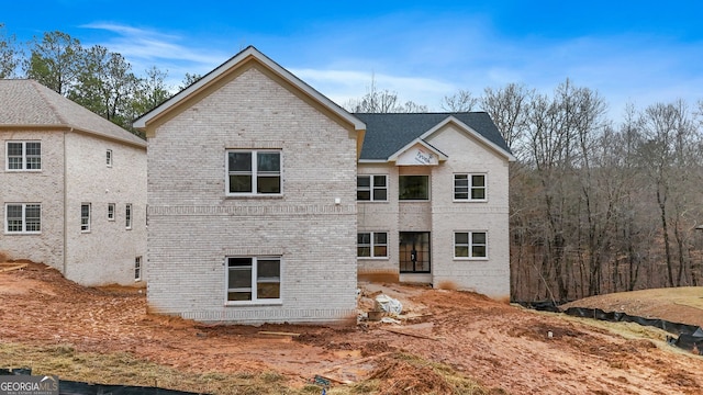 back of property with brick siding