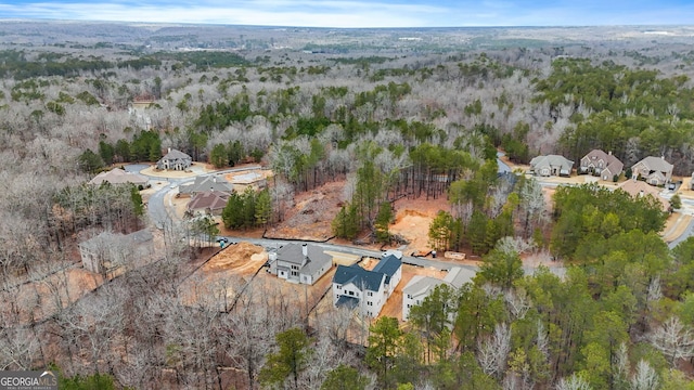 drone / aerial view with a forest view