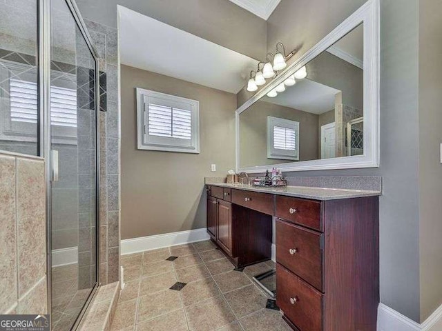 bathroom with walk in shower, tile patterned flooring, ornamental molding, and vanity