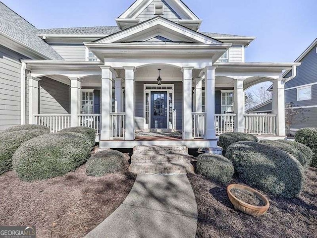 entrance to property with a porch