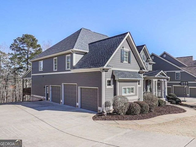 view of side of home with a garage