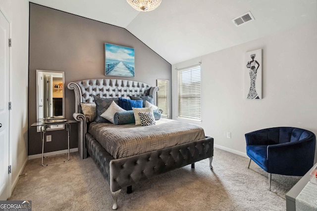 carpeted bedroom featuring vaulted ceiling