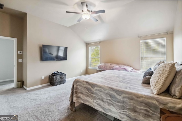 carpeted bedroom with lofted ceiling and ceiling fan