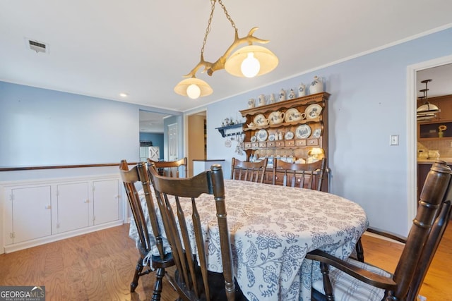 dining room featuring light hardwood / wood-style flooring