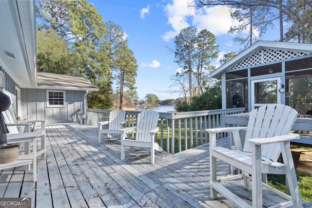 wooden terrace with a sunroom