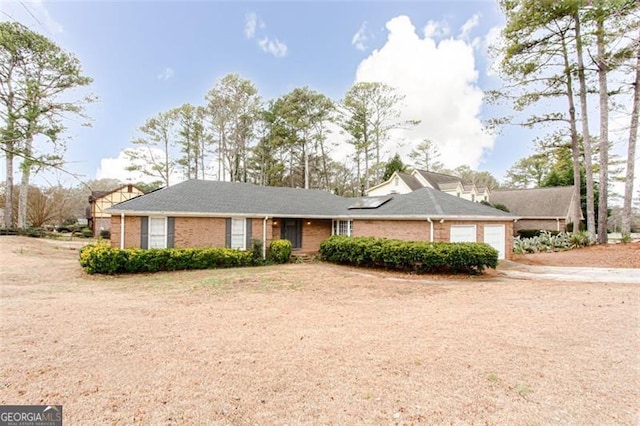 single story home with a garage