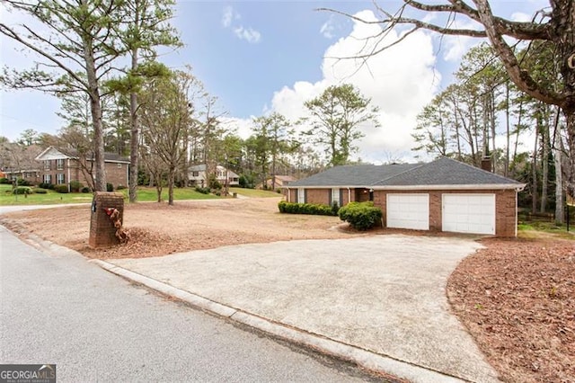 ranch-style home with a garage