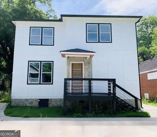 view of front of house with a wooden deck