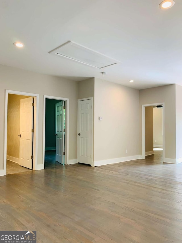 empty room featuring hardwood / wood-style floors