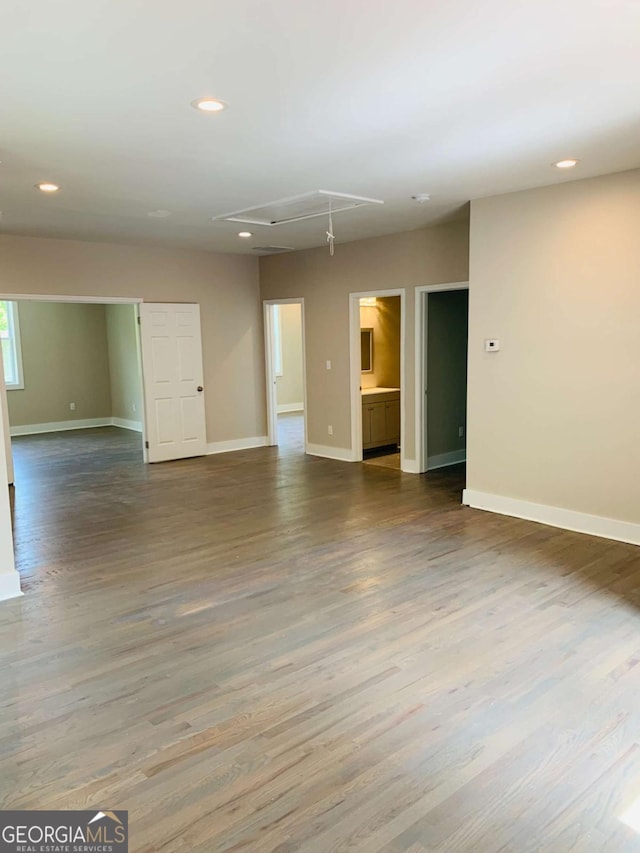 empty room featuring wood-type flooring