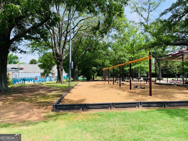 surrounding community featuring a playground