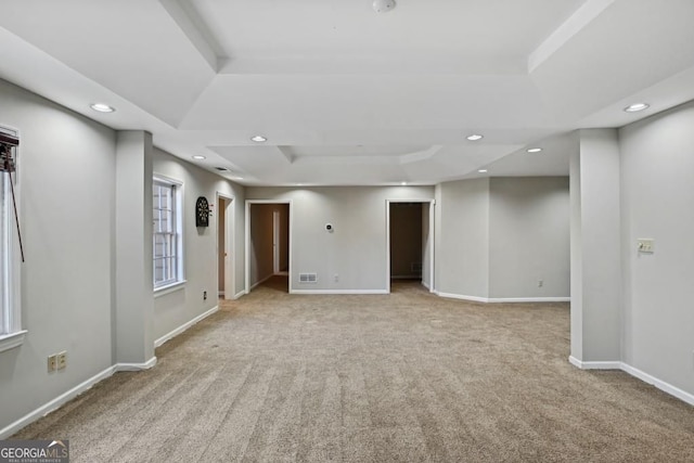 basement featuring carpet floors, recessed lighting, baseboards, and visible vents