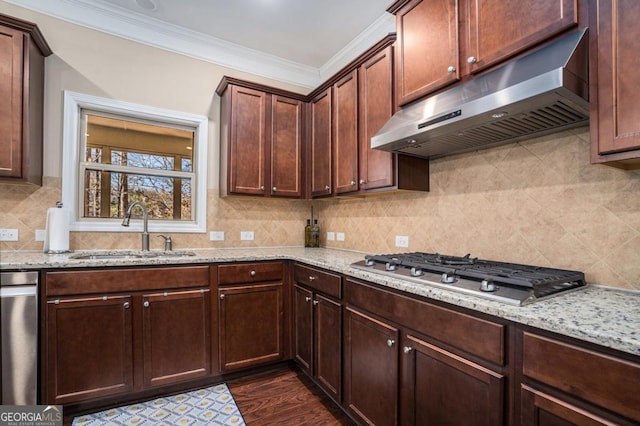 kitchen with sink, dark hardwood / wood-style flooring, light stone counters, and stainless steel gas cooktop