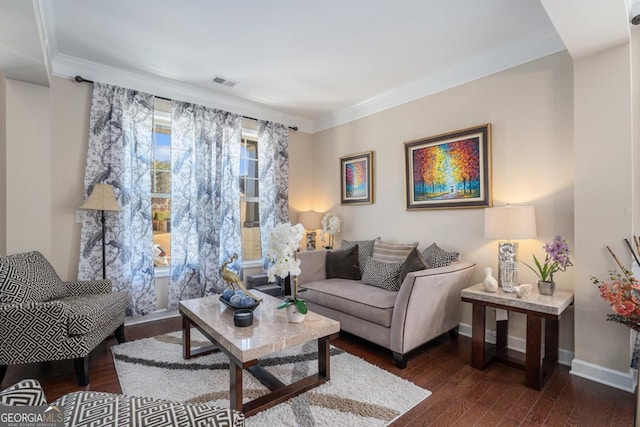 living room featuring ornamental molding and dark hardwood / wood-style flooring