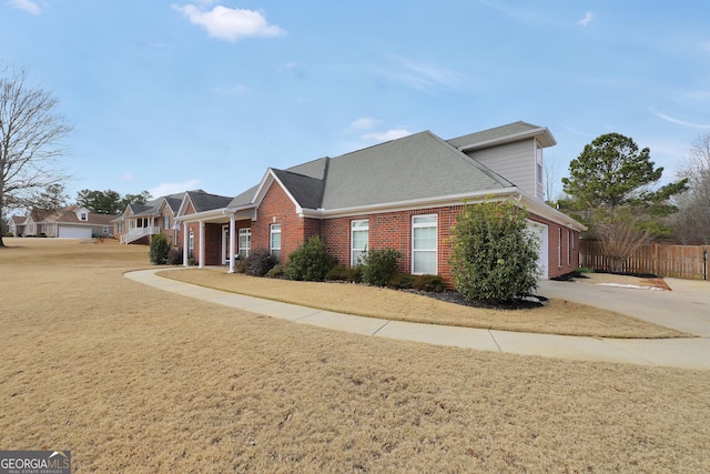 view of home's exterior with a yard