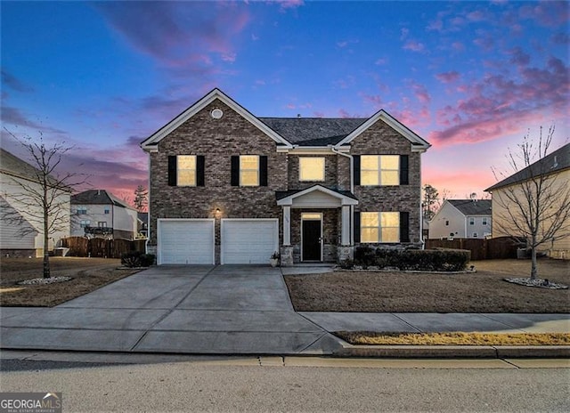 front of property with a garage