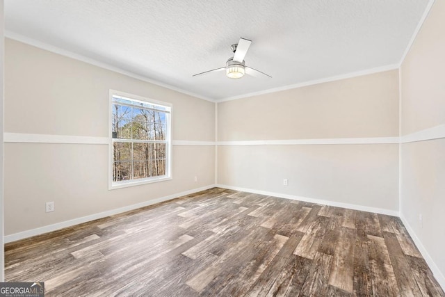 empty room featuring a textured ceiling, ceiling fan, crown molding, and hardwood / wood-style flooring